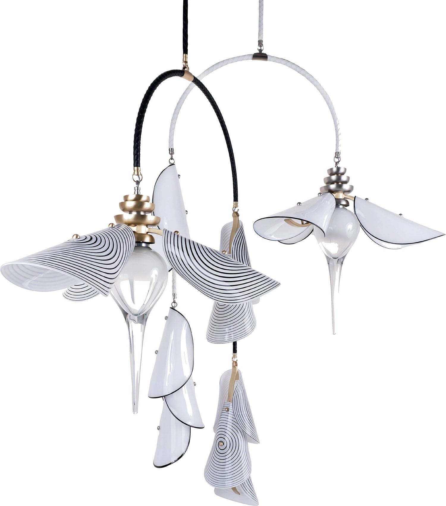 Three white and gold ceiling lights with black and white shades.