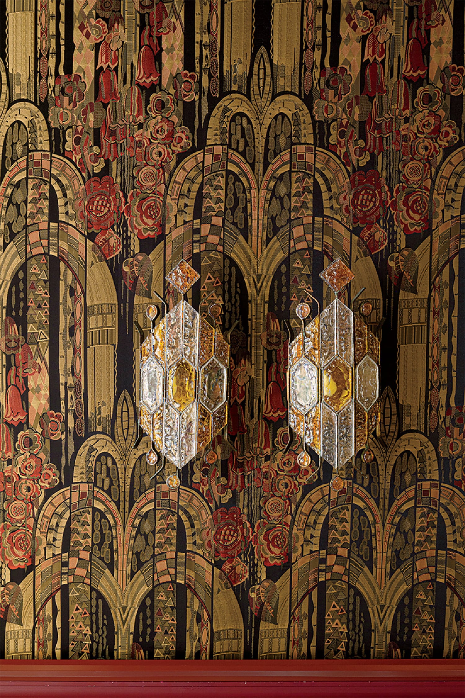 A red bench in an ornate room
