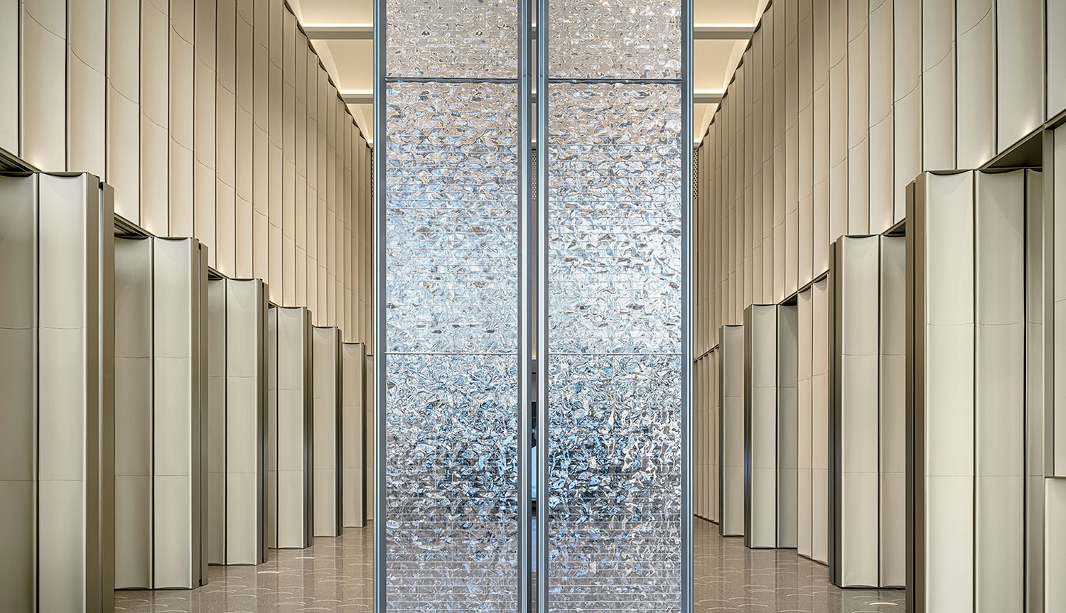 A large glass door in a hallway.