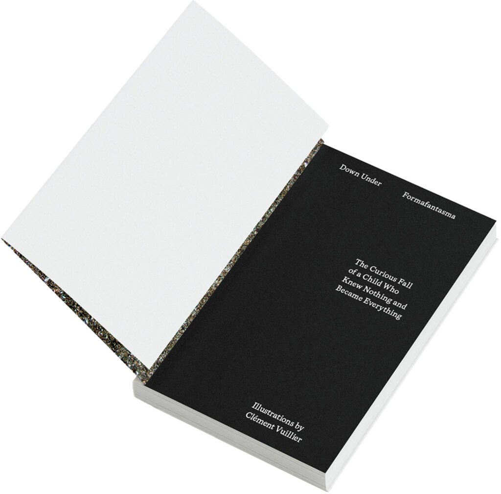 A book with a black cover and white pages.