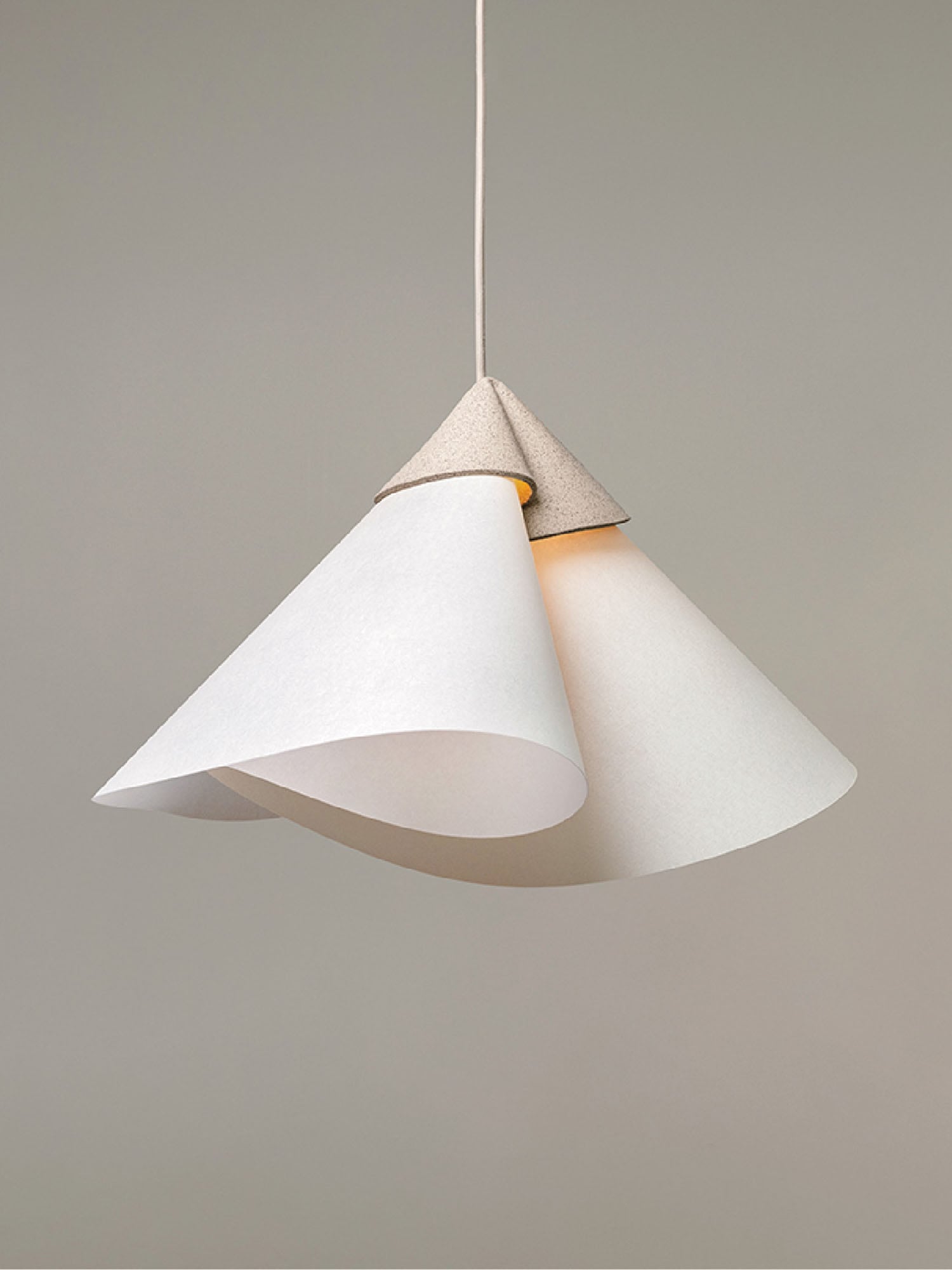 A white light hanging from a ceiling.