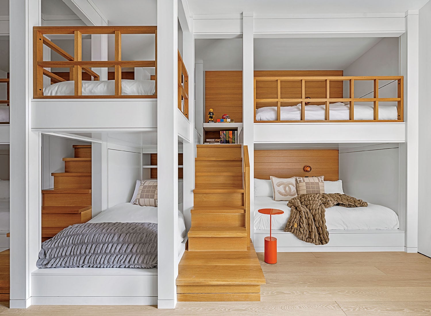 A room with a bed and a bunk.