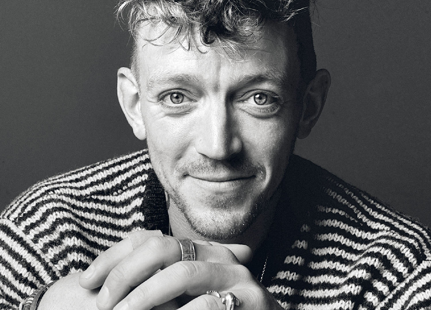 A man with a ring on his finger.