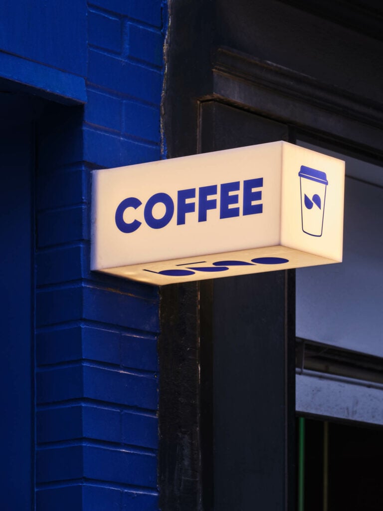 white sign for coffee lit up