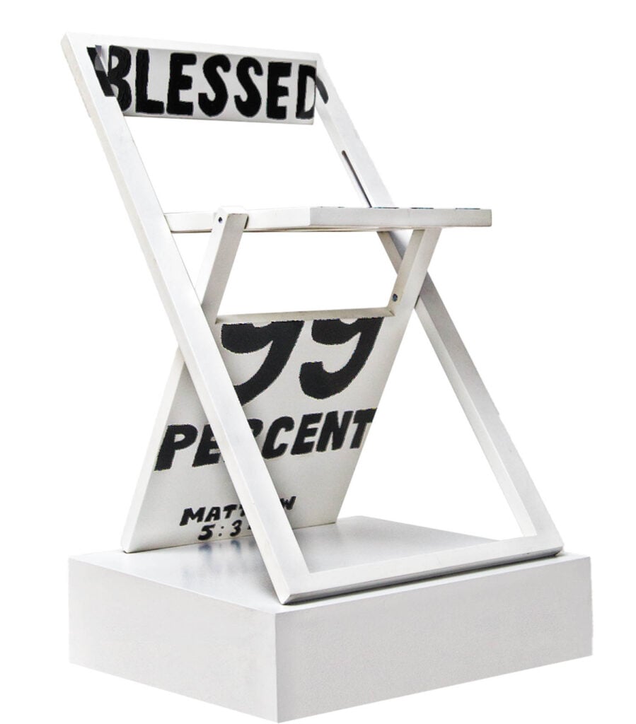 a folding white chair with text