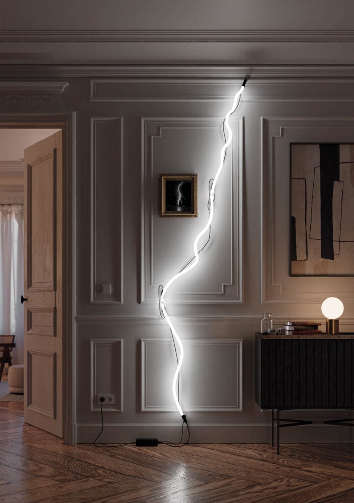 a lighting bolt shape through a wall