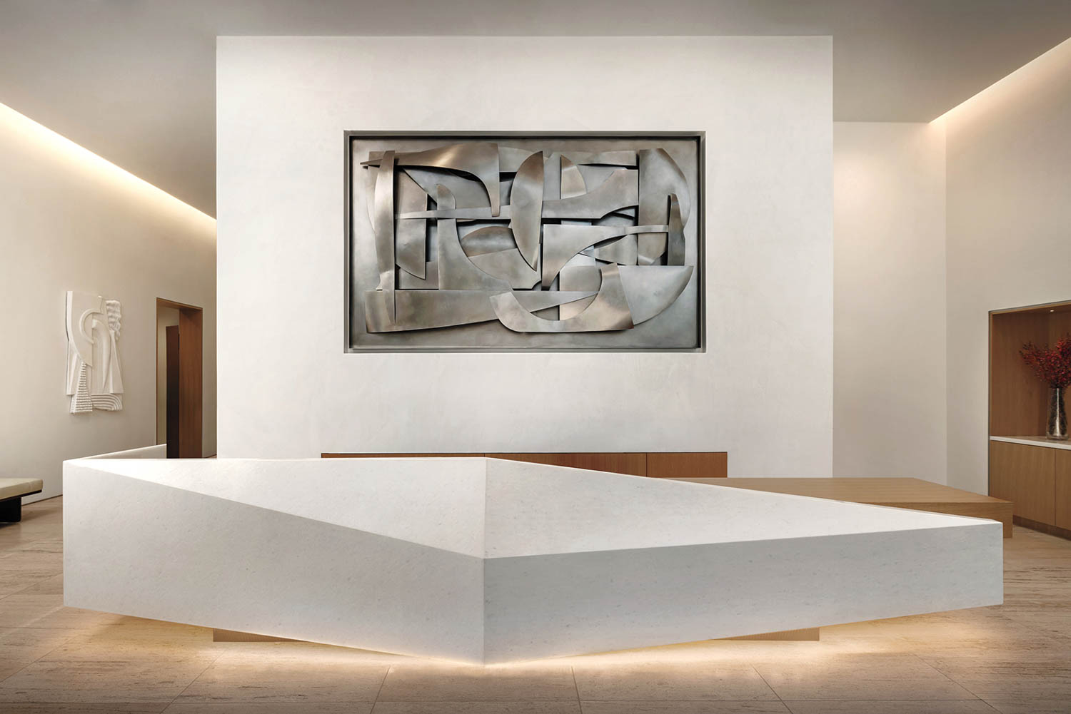 a sculptural seating area near art