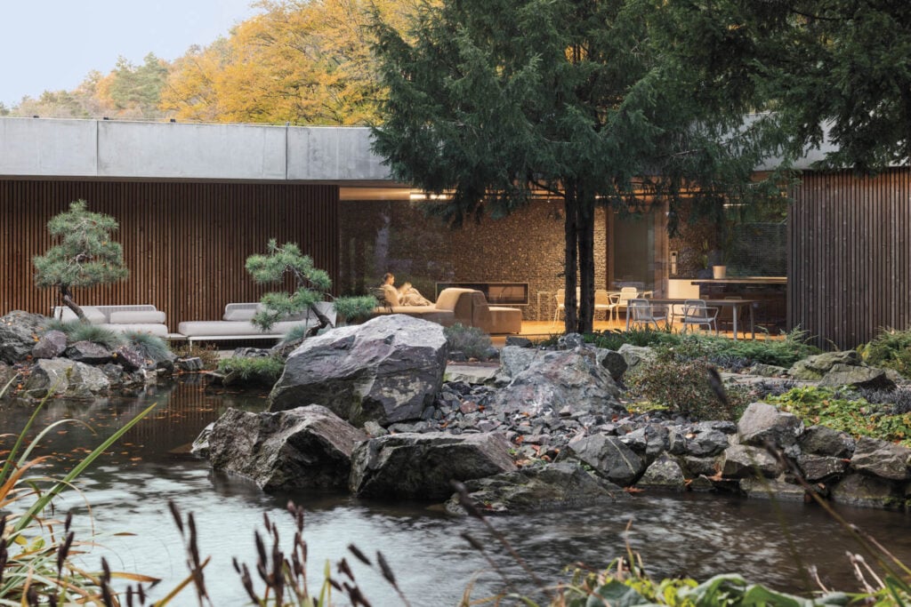 outdoor garden area with lovely pond