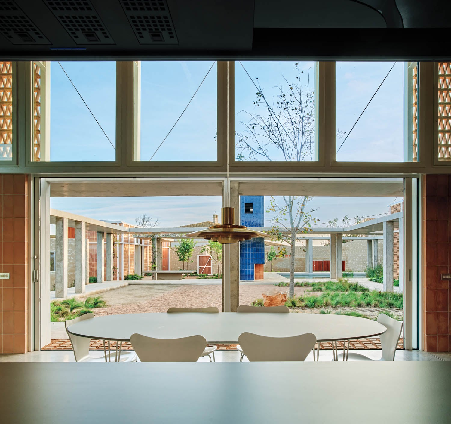 dining area with white table and chairs