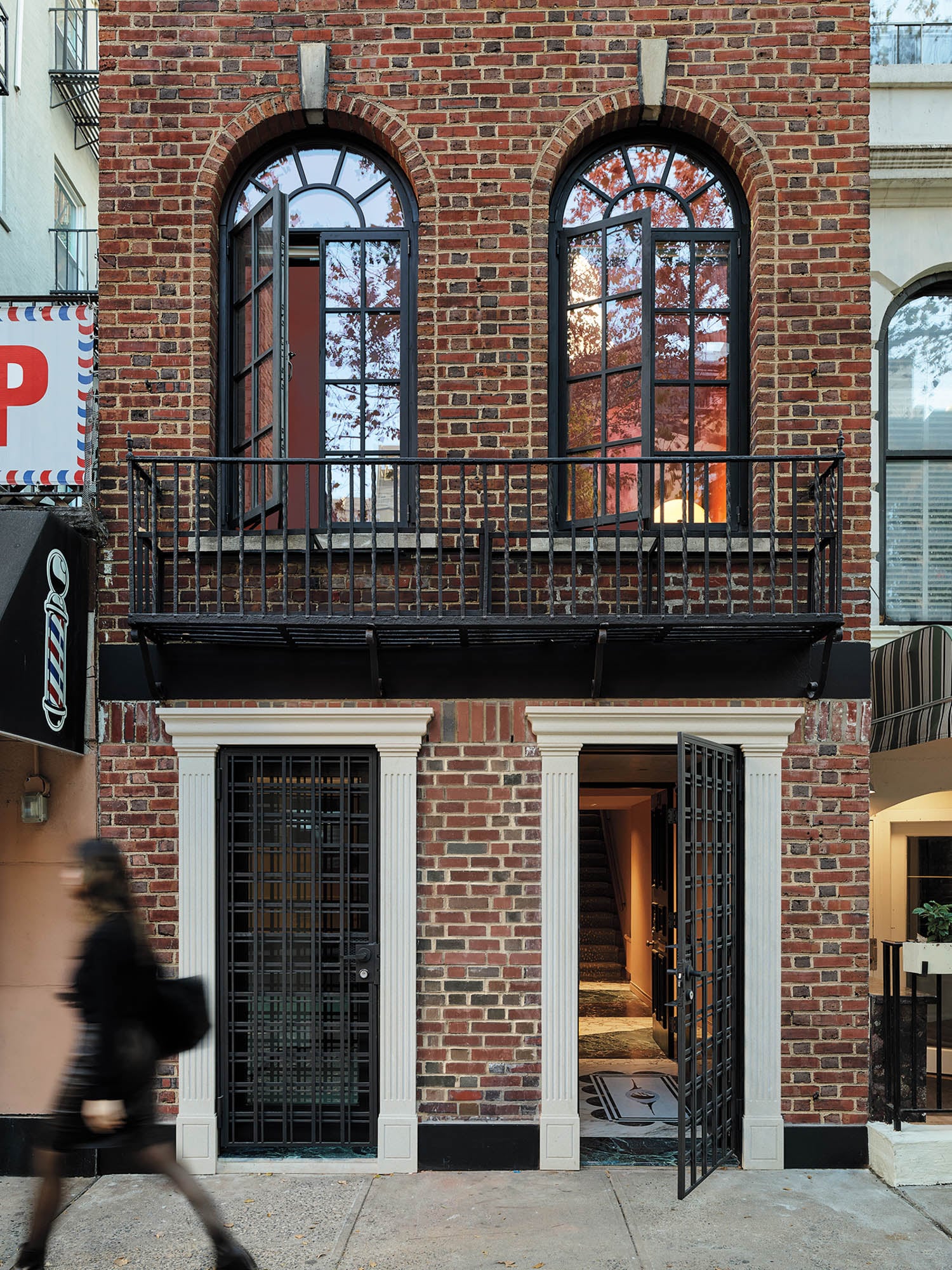 brick exterior of home with double entry