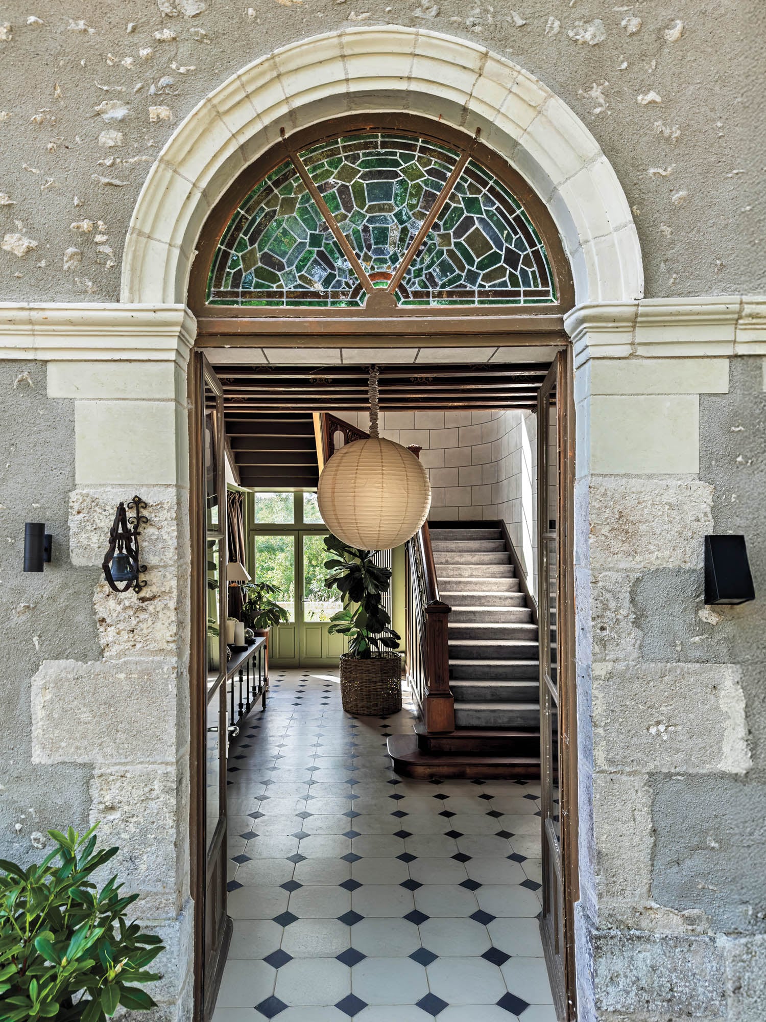 entryway into home with arches