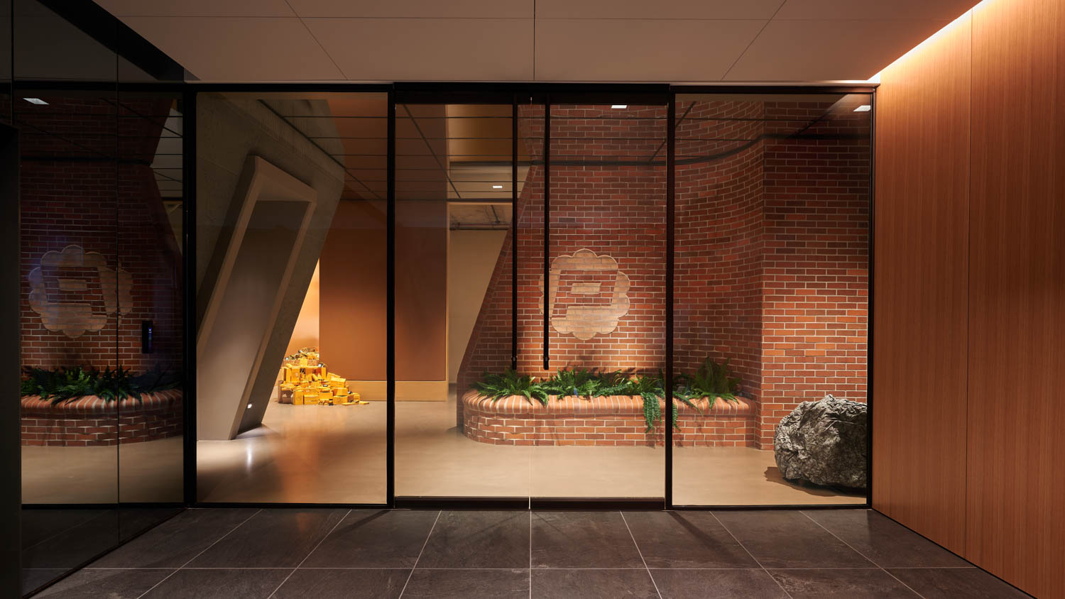 brick covered reception area with Panic logo