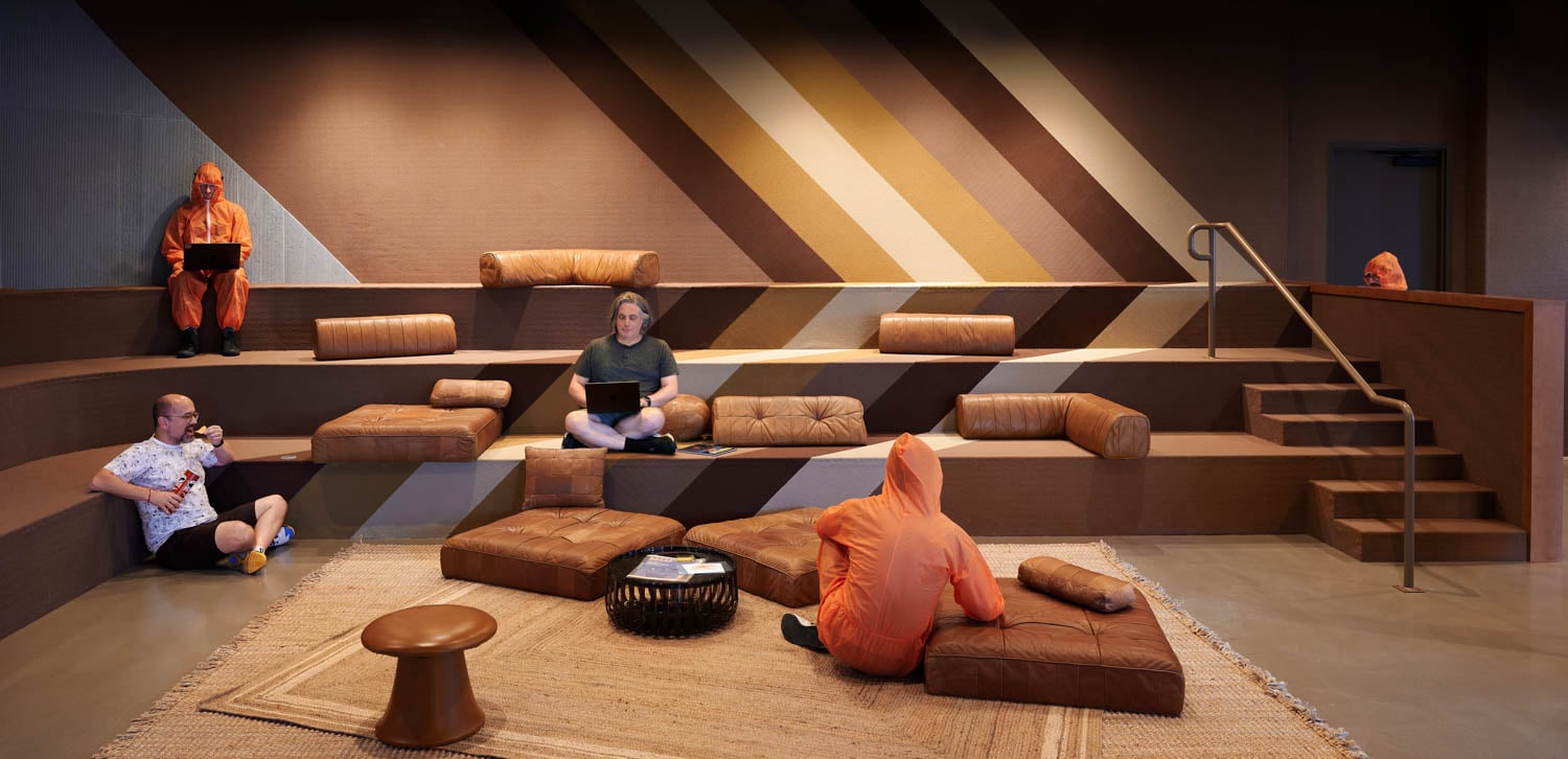 seating area with pillows and chevron pattern