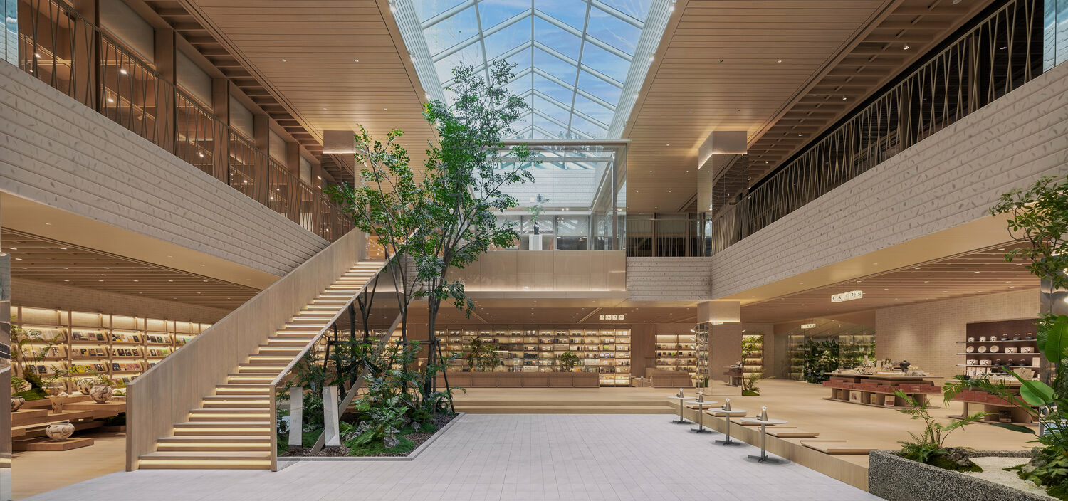 lobby with glass windows and roof